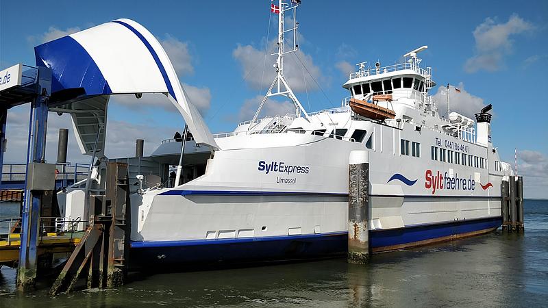 Shows the Sylt Express at the port of Havneby, Denmark.